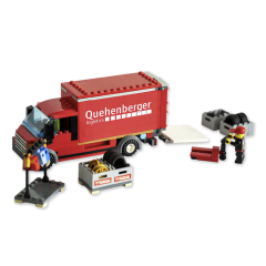 Assembled truck model with open loading ramp, including components such as clothes rack, pallet with boxes, hand pallet truck, and a figure